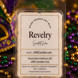 Revelry scented wax melts clamshell with Mardi Gras beads and feathered mask