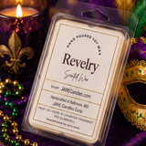 Revelry wax melts clamshell tilted on purple velvet beside a lit candle