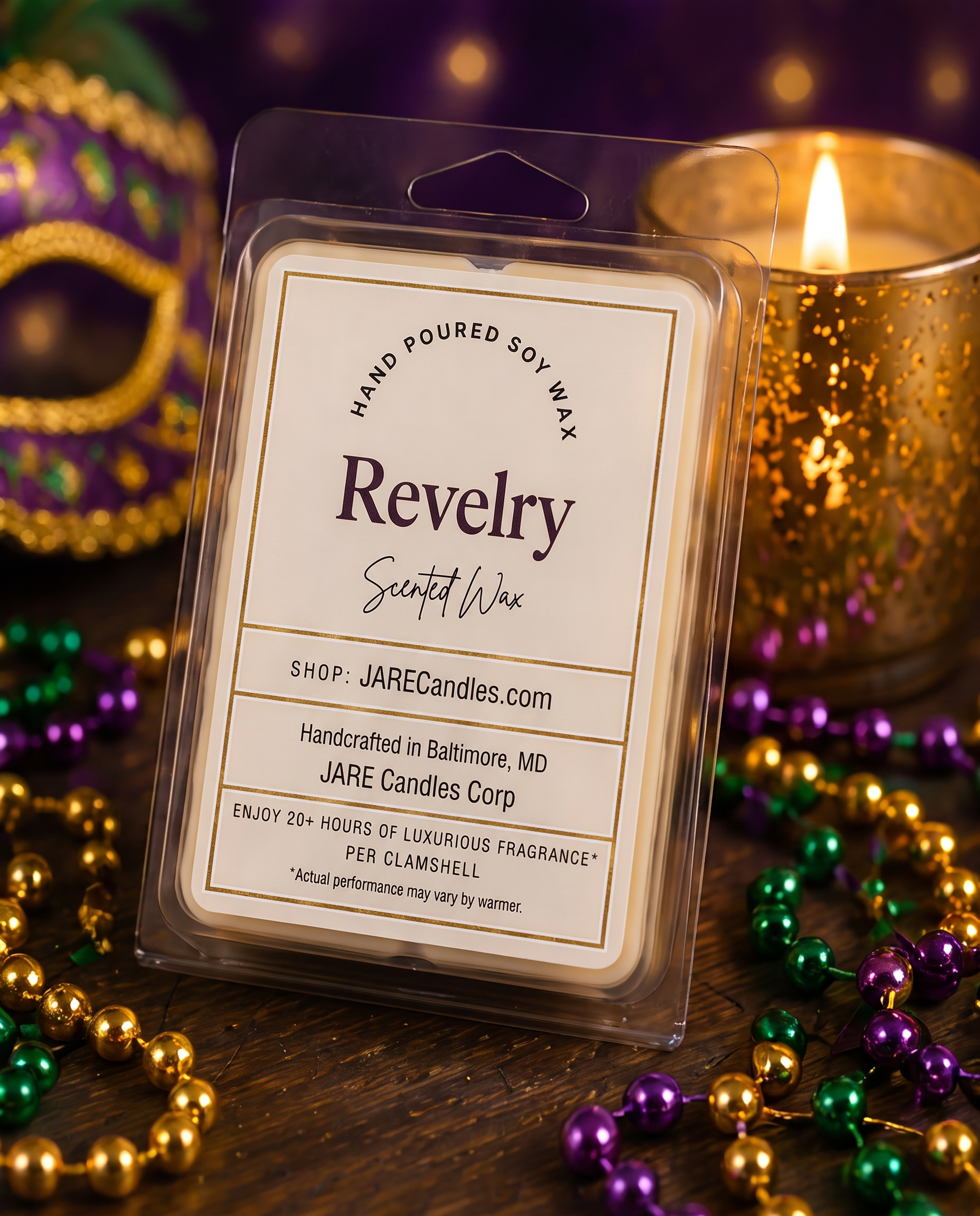 Revelry wax melts clamshell beside a glowing gold mercury glass candle