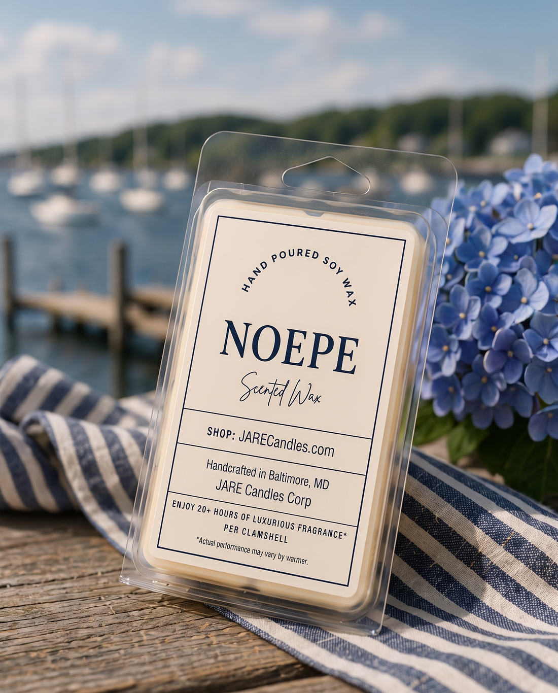 Noepe scented wax melts clamshell on a dock with lighthouse, rope and seashells