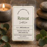 Retreat wax melts clamshell with stacked river stones and eucalyptus branches