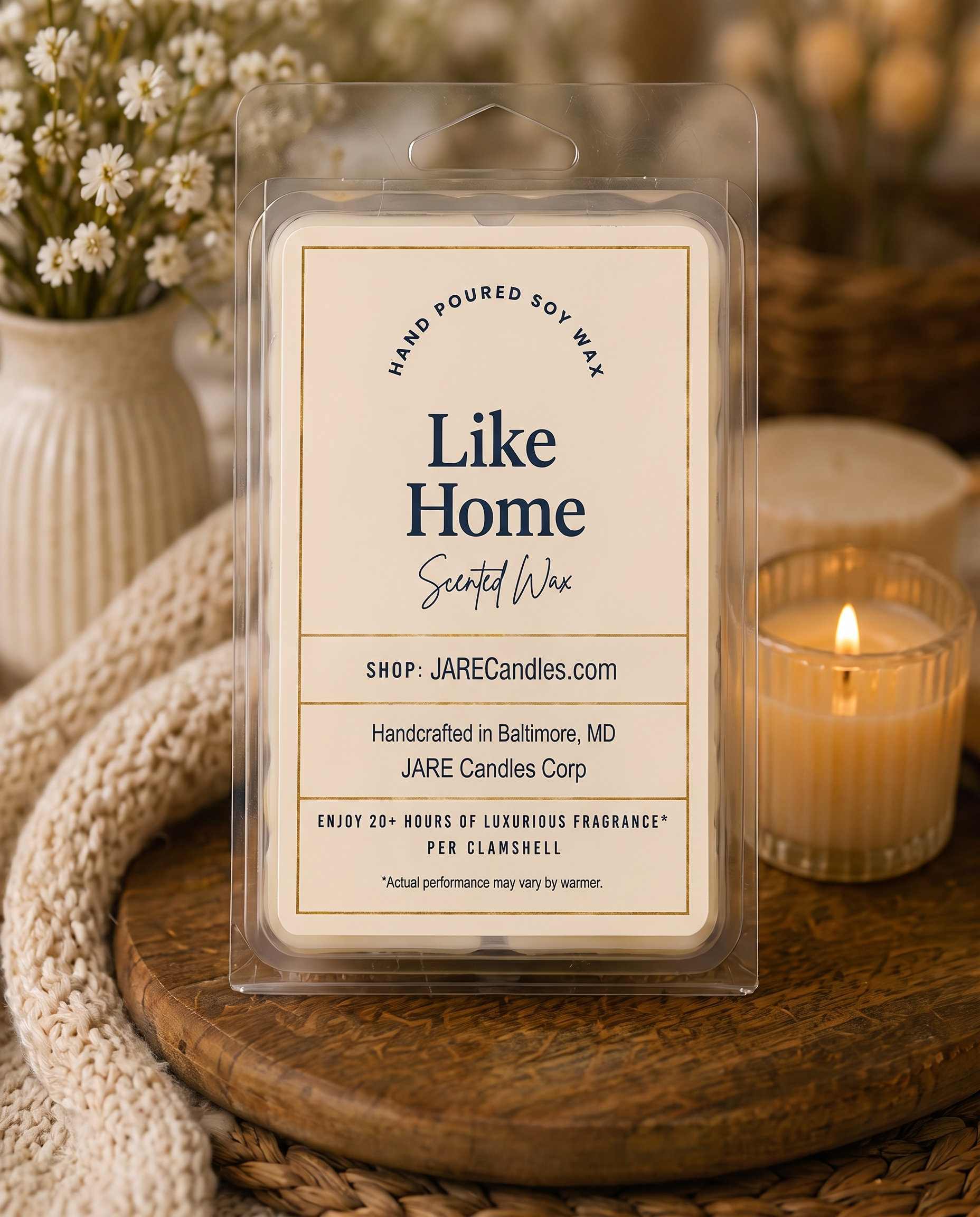 Like Home wax melts clamshell on a wooden board with dried flowers and candlelight