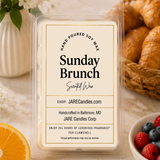 Sunday Brunch wax melts clamshell styled with white flowers, croissants and fresh berries