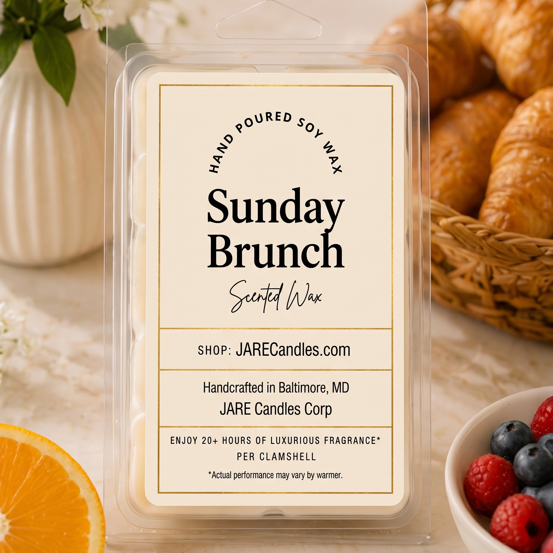 Sunday Brunch wax melts clamshell styled with white flowers, croissants and fresh berries