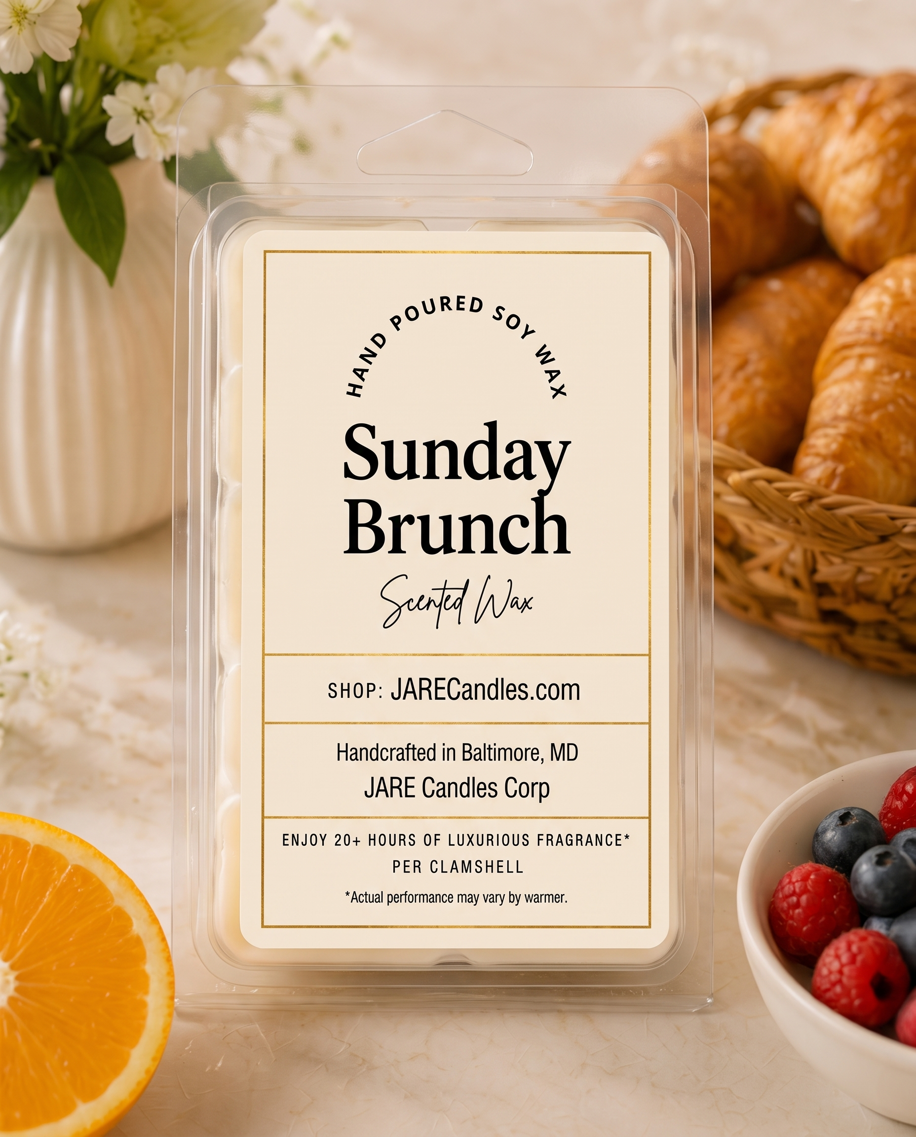 Sunday Brunch wax melts clamshell styled with white flowers, croissants and fresh berries