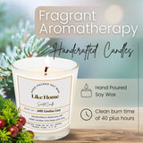 Like Home hand-poured soy candle by JARE Candles with greenery and berries on wooden surface, pine fir fragrance
